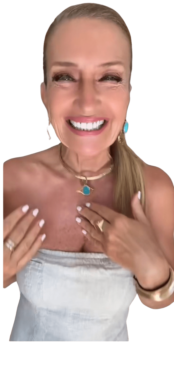 Woman holding the pendant close