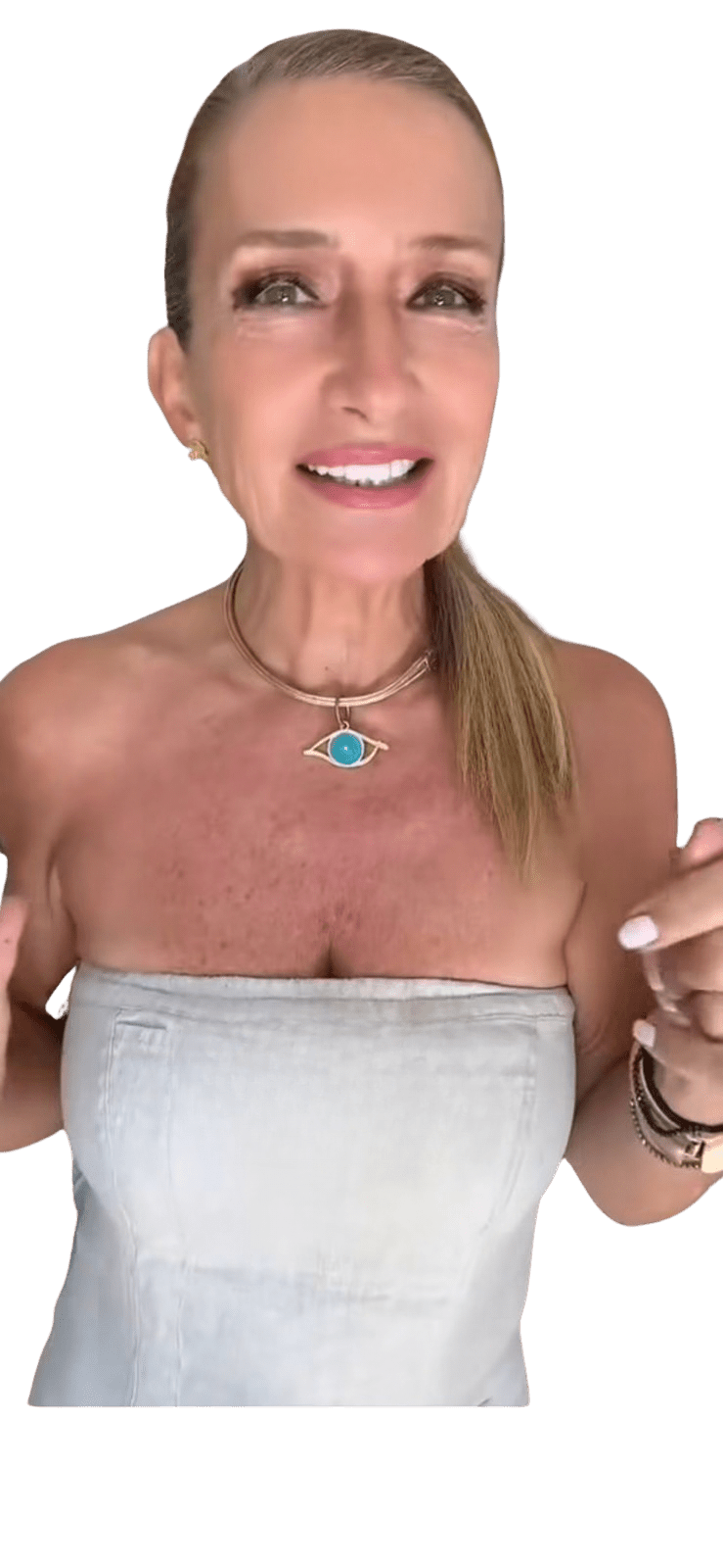 Woman holding the evil eye pendant